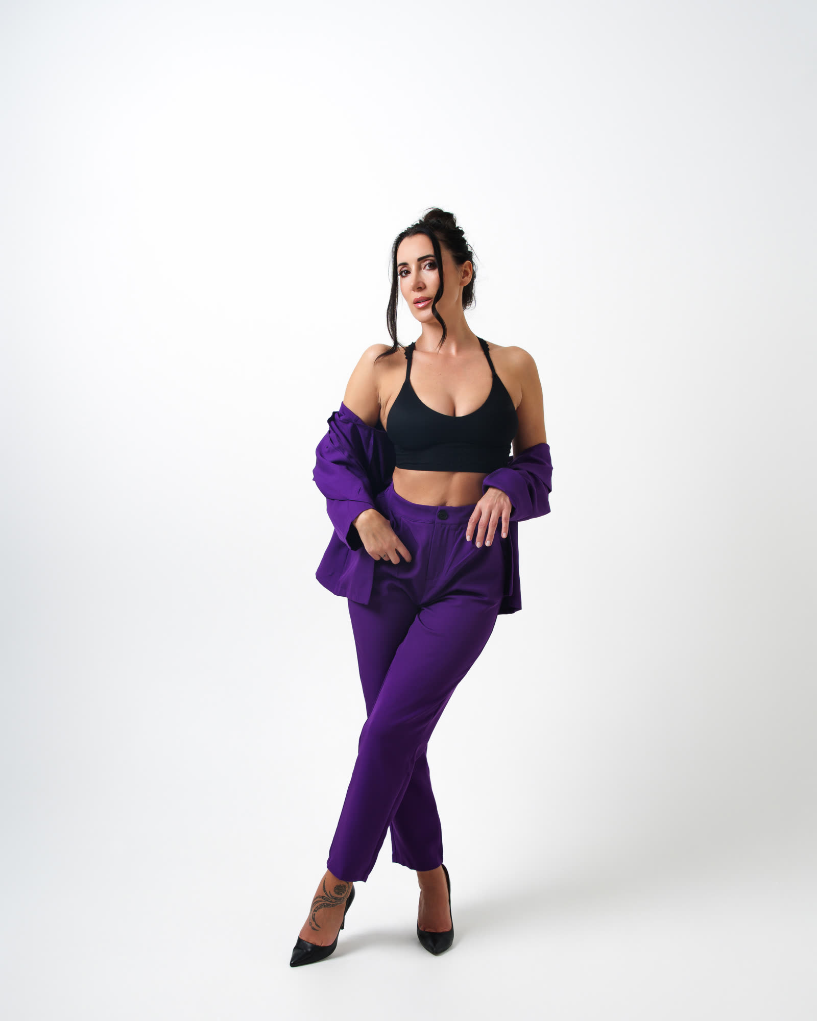 Editorial fashion session — woman in a purple suit on a white background, portrait photographer Kraków